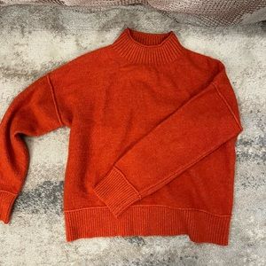Burnt orange sweater